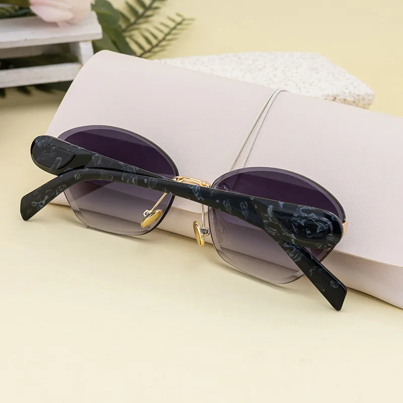 Retro Classic Style Geometric Pc Cat Eye Frameless Women's Sunglasses display picture 3