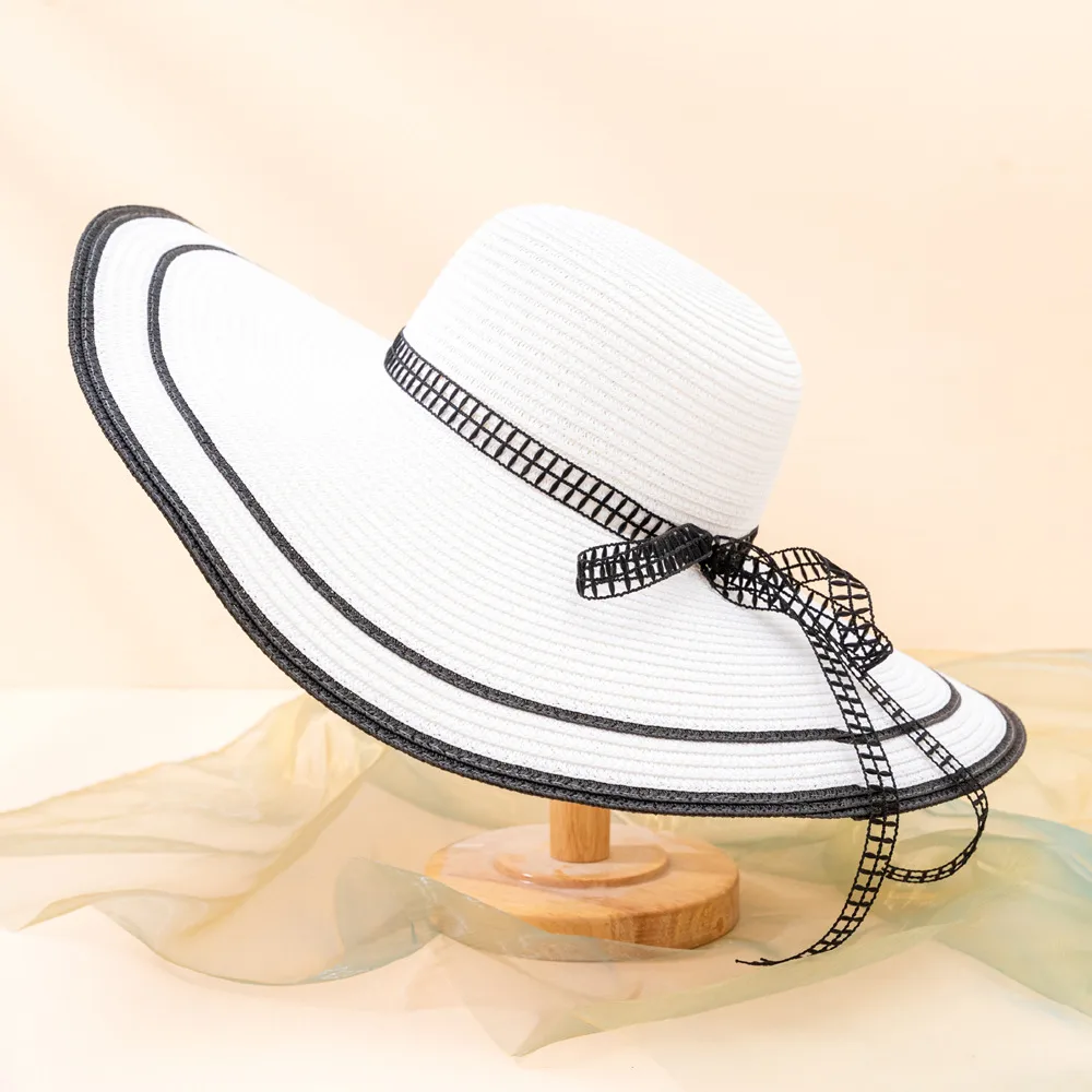 Women's Bow Knot Big Eaves Modern Style Straw Hat display picture 2
