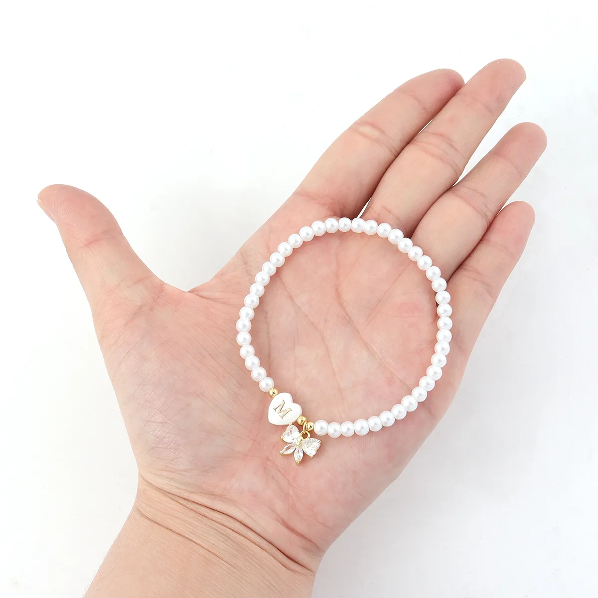 Lettre Forme De Cœur Noeud D'Arc Élégant Style Simple Style Classique Acier Inoxydable 304 Perle Artificielle Bracelets De Gros display picture 4