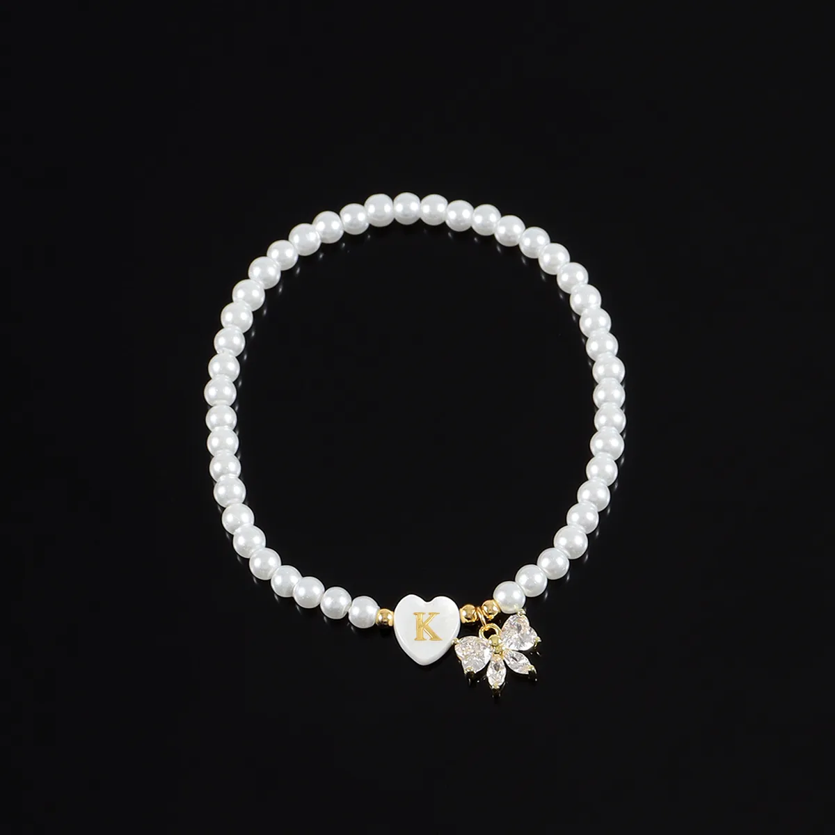 Lettre Forme De Cœur Noeud D'Arc Élégant Style Simple Style Classique Acier Inoxydable 304 Perle Artificielle Bracelets De Gros display picture 3