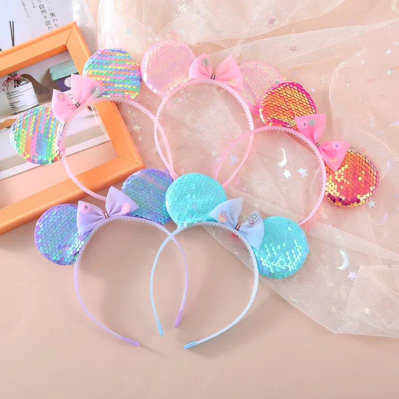 Children's Headband  Colorful Sequined Headband Bow Toothed Cute Girl Small Ears Holiday Paradise Headdress display picture 1