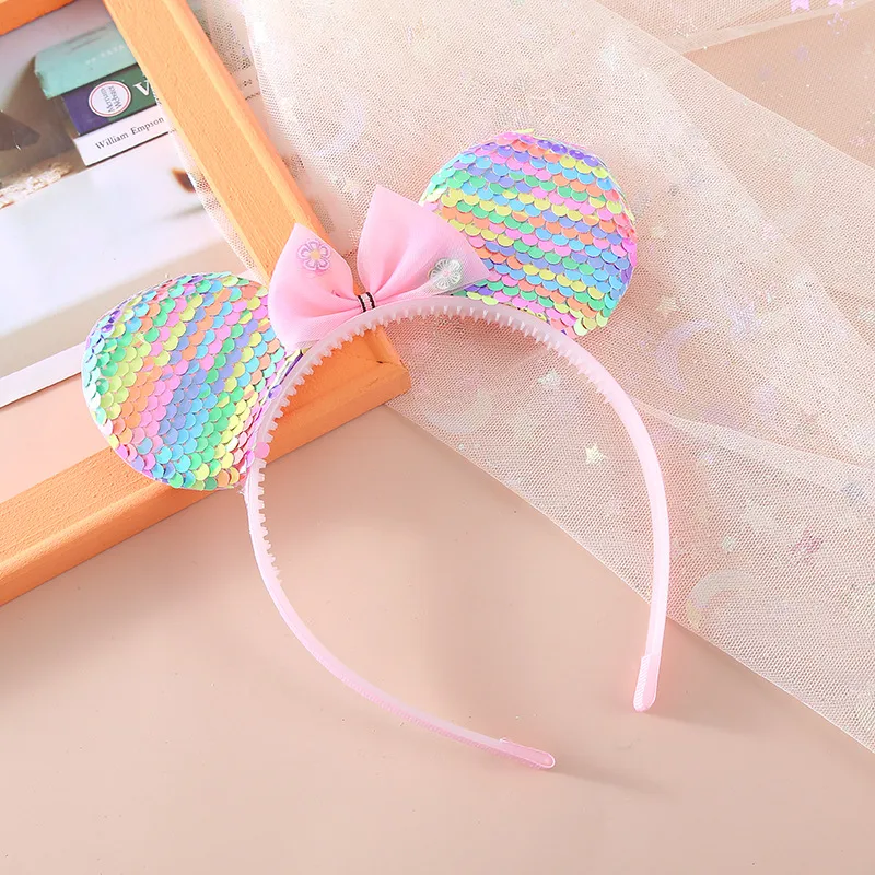 Children's Headband  Colorful Sequined Headband Bow Toothed Cute Girl Small Ears Holiday Paradise Headdress display picture 3