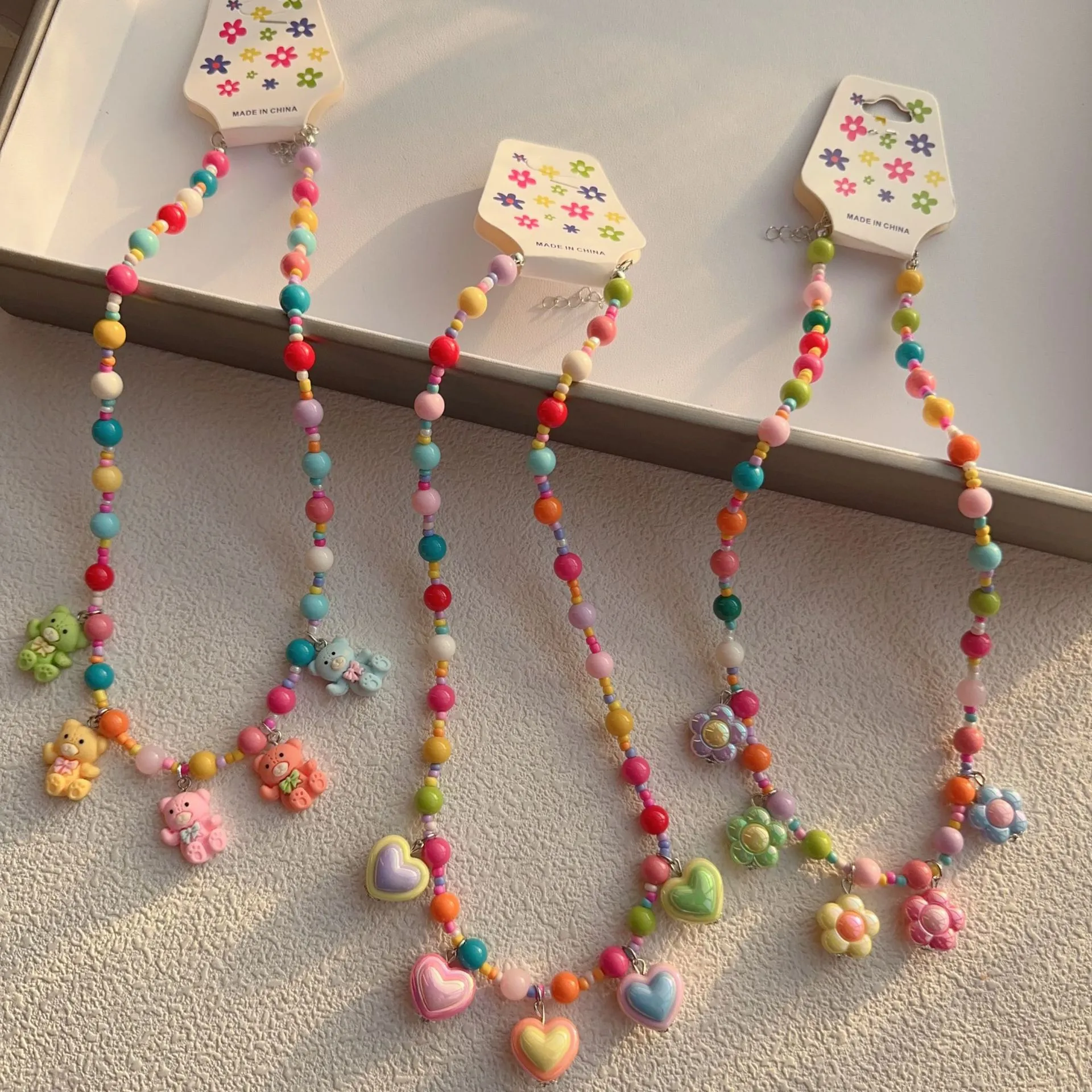 Nouveau Style Coréen Coloré Perlé XINGX Petite Fleur Ours Collier Mignon Enfants Dessin Animé Perles De Collier Collier Collier display picture 3