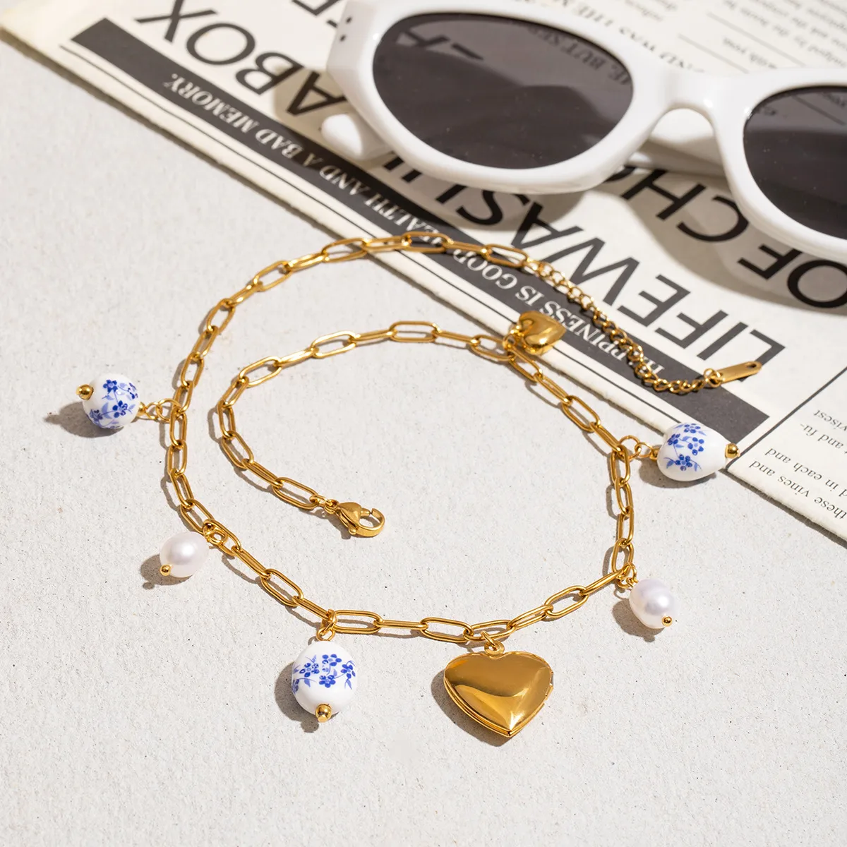 Stainless Steel Titanium Steel Sun Heart Shape Pearl Plating Ceramics Women's Earrings Necklace display picture 9