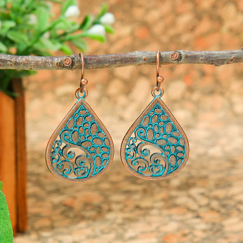 New Hot Sale Simple Personality Ethnic Minority Vacation Style Earrings Vintage Geometric Hollow Delicate Ear Rings Wholesale display picture 6