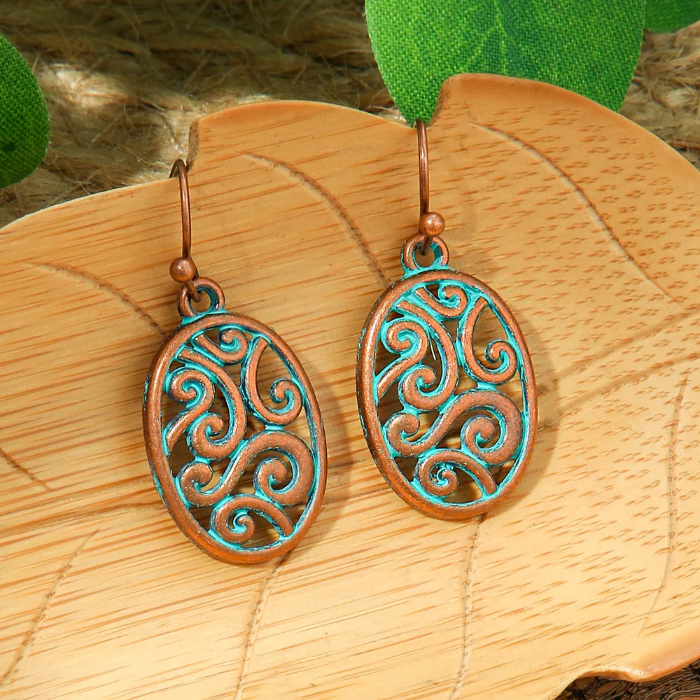 New Hot Sale Simple Personality Ethnic Minority Vacation Style Earrings Vintage Geometric Hollow Delicate Ear Rings Wholesale display picture 7