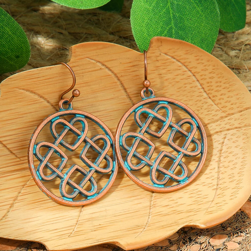 New Hot Sale Simple Personality Ethnic Minority Vacation Style Earrings Vintage Geometric Hollow Delicate Ear Rings Wholesale display picture 8