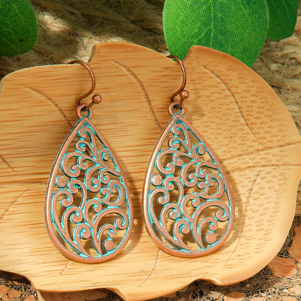 New Hot Sale Simple Personality Ethnic Minority Vacation Style Earrings Vintage Geometric Hollow Delicate Ear Rings Wholesale display picture 10