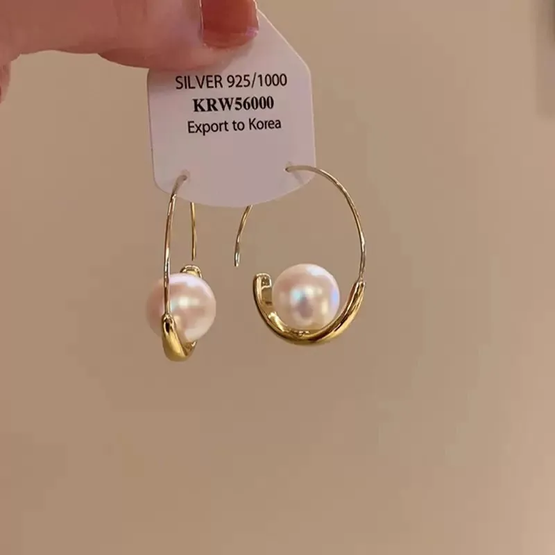 Pendientes Redondos Ligeros De Lujo Con Alto Sentido De Las Mujeres Con Textura Súper Versátil Pendientes Brillantes Y Simples Pendientes Con Diseño De Nicho display picture 7
