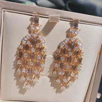 Les Gouttelettes D'Eau Le Cuivre Pierres Précieuses Artificielles Des Boucles D'Oreilles main image 3