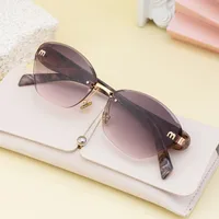 Lunettes De Soleil Sans Cadre Rétro Style Classique Géométrique Pc Cat Eye Femmes main image 3