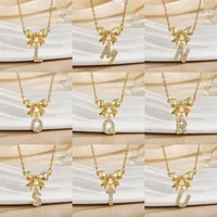 Simple 26 Letters Inlaid Zircon Bow Necklace Women's Simple High Sense Ornament Titanium Steel No Fading main image 1