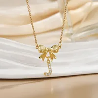 Simple 26 Letters Inlaid Zircon Bow Necklace Women's Simple High Sense Ornament Titanium Steel No Fading sku image 8
