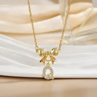 Simple 26 Letters Inlaid Zircon Bow Necklace Women's Simple High Sense Ornament Titanium Steel No Fading sku image 14