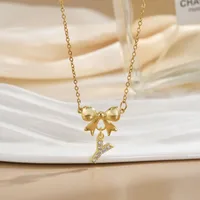 Simple 26 Letters Inlaid Zircon Bow Necklace Women's Simple High Sense Ornament Titanium Steel No Fading sku image 22