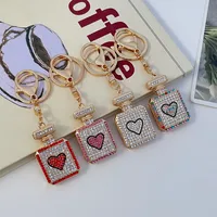 Estilo Coreano Aleación De Zinc Forma De Corazón Mujeres Colgante De Bolsa Llaveros main image 1