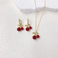 Élégant Femme Reine Le Cuivre Cerise Coeur Rouge Noeud D'Arc Placage Résine Zircon Plaqué Or 18K Femmes Ensemble De Bijoux main image 1