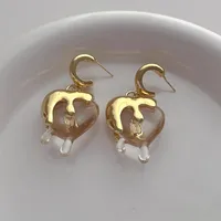 Style Européen Et Américain En Forme De Coeur Or Lave Amour Coeur Boucles D'oreilles Femmes Mode, Personnalisé Et Exagéré Lumière De Luxe En Forme De Coeur Gouttes main image 5
