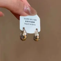 Pendientes Redondos Ligeros De Lujo Con Alto Sentido De Las Mujeres Con Textura Súper Versátil Pendientes Brillantes Y Simples Pendientes Con Diseño De Nicho sku image 1